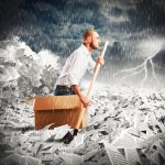 Man paddling in a sea of ​​sheets
